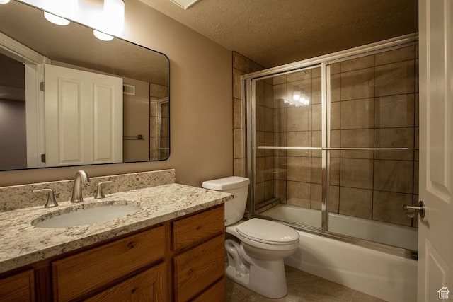 2783 S Irene Dr E, Bountiful, UT 84010 - bathroom featuring vanity, shower / bath combination with glass door, toilet, a textured ceiling, and visible vents
