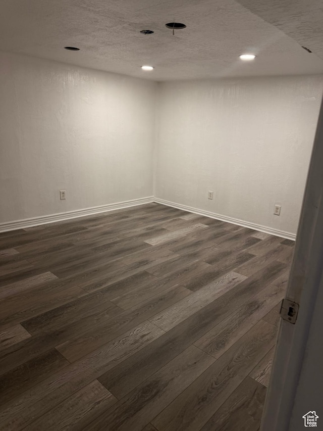 793 N 1200 W, Salt Lake City, UT 84116 - spare room with dark wood-style flooring, a textured ceiling, and recessed lighting