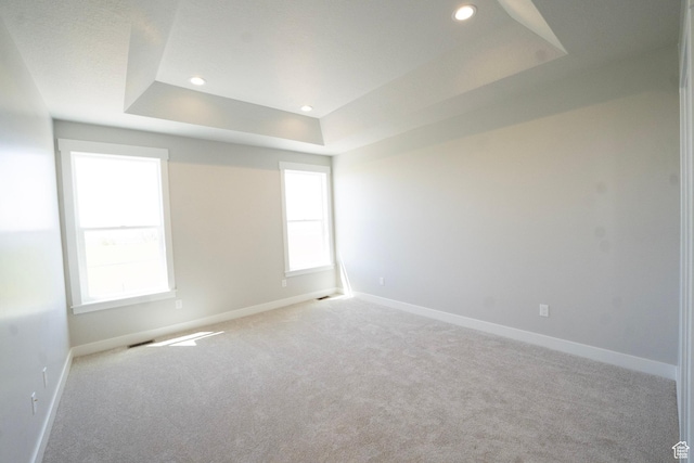 573 N 510 E Unit 20, Smithfield, UT 84335 - carpeted empty room with a raised ceiling, baseboards, healthy amount of natural light, and recessed lighting