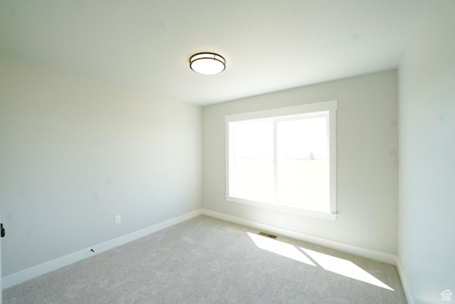 573 N 510 E Unit 20, Smithfield, UT 84335 - carpeted spare room with baseboards