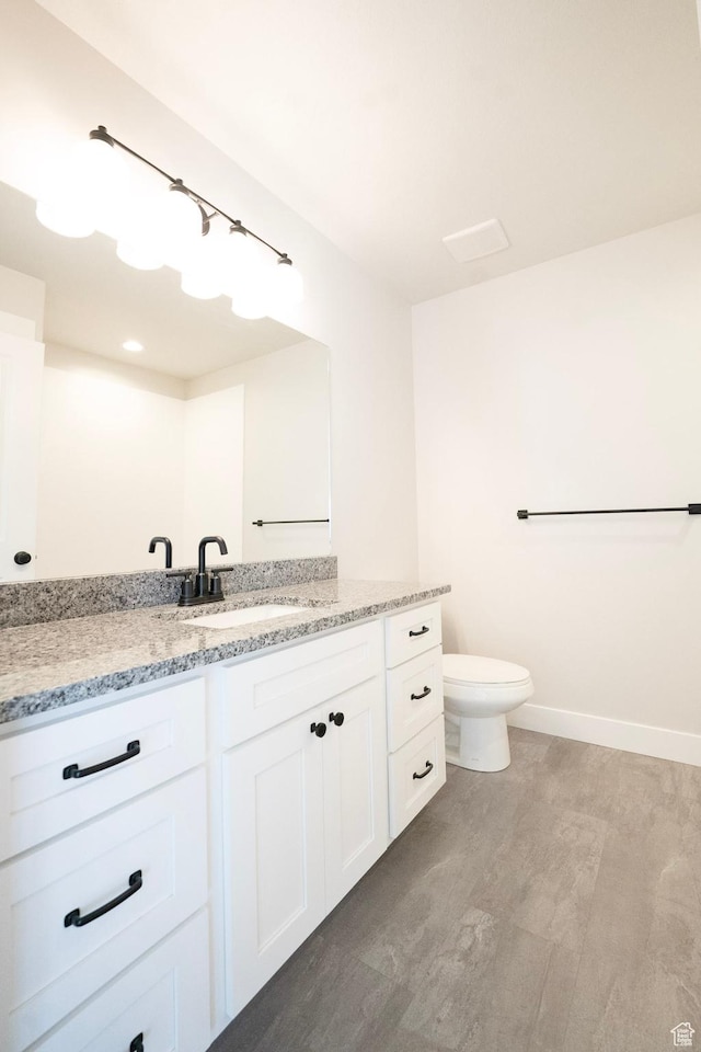 573 N 510 E Unit 20, Smithfield, UT 84335 - bathroom featuring vanity, toilet, and baseboards