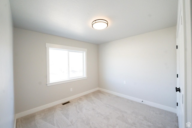 573 N 510 E Unit 20, Smithfield, UT 84335 - carpeted spare room featuring baseboards