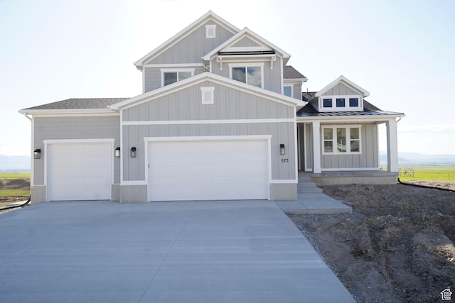 573 N 510 E Unit 20, Smithfield, UT 84335 - craftsman inspired home with an attached garage, board and batten siding, and concrete driveway