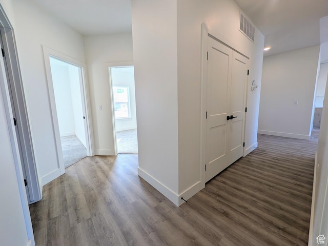 corridor featuring hardwood / wood-style flooring