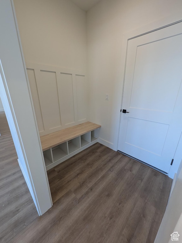 mudroom with dark hardwood / wood-style floors