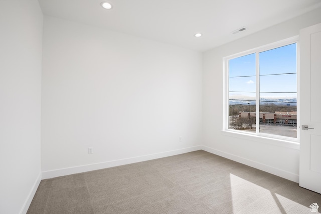 spare room with carpet flooring