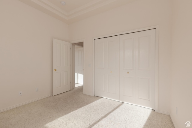 2365 E 160 S, St George, UT 84790 - unfurnished bedroom featuring carpet, a tray ceiling, and a closet