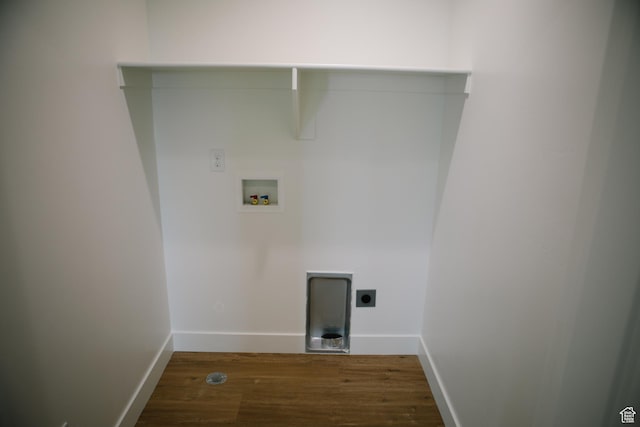 laundry area with hookup for an electric dryer, dark hardwood / wood-style flooring, and hookup for a washing machine