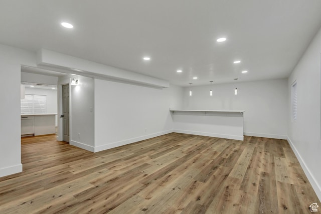 12756 S Diamond Back Dr W, Riverton, UT 84096 - unfurnished living room featuring light hardwood / wood-style flooring