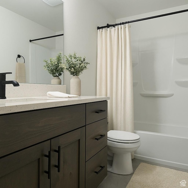 full bathroom featuring vanity, toilet, and shower / tub combo with curtain