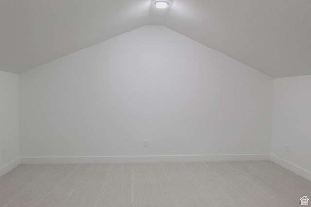 626 E 2450 N, North Logan, UT 84341 - bonus room featuring lofted ceiling, light carpet, and baseboards