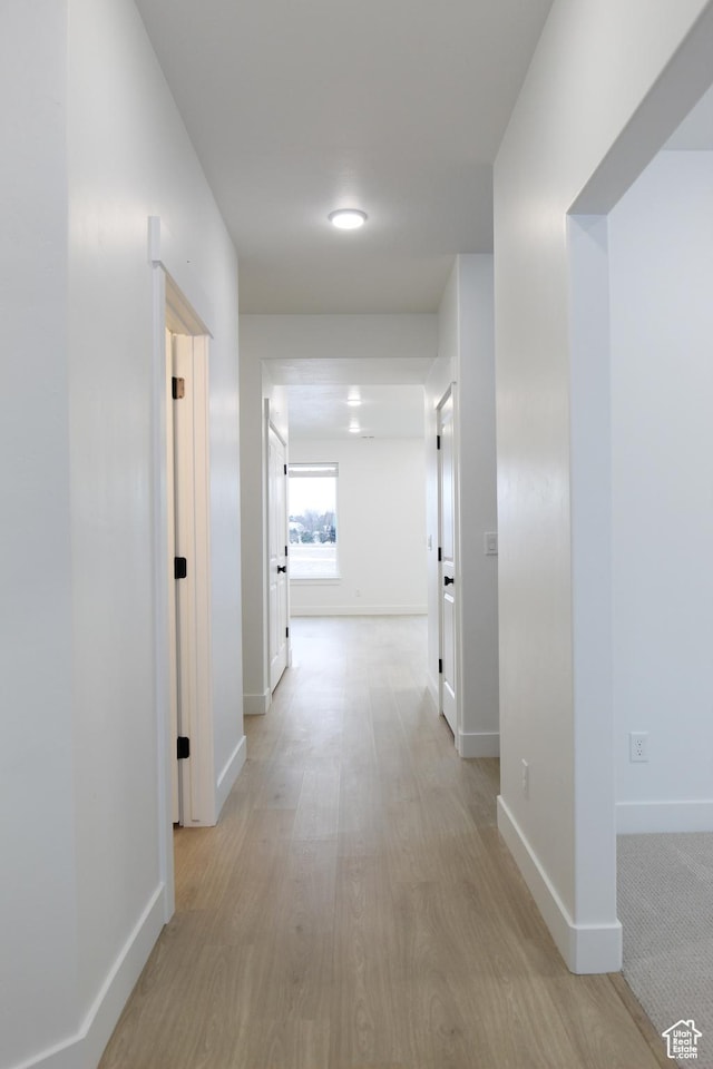 626 E 2450 N, North Logan, UT 84341 - corridor with baseboards and light wood-style flooring