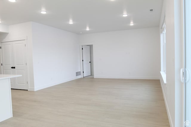 626 E 2450 N, North Logan, UT 84341 - spare room featuring light wood-style floors, baseboards, and recessed lighting