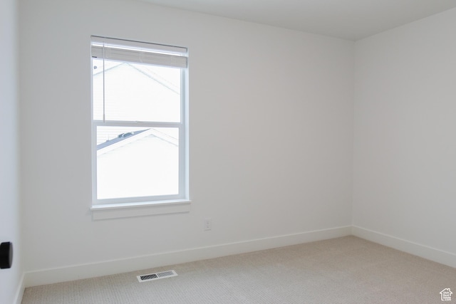 626 E 2450 N, North Logan, UT 84341 - spare room featuring carpet flooring, plenty of natural light, and baseboards