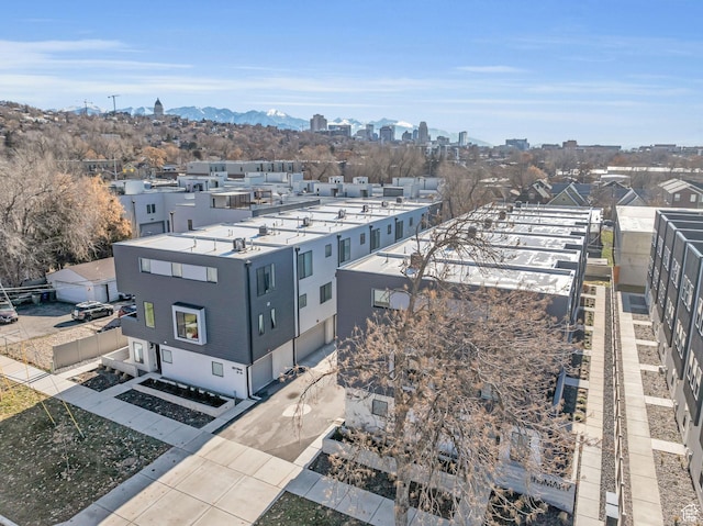 birds eye view of property featuring a view of city