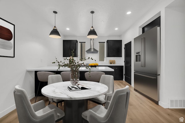 dining area with visible vents, recessed lighting, baseboards, and light wood-style floors