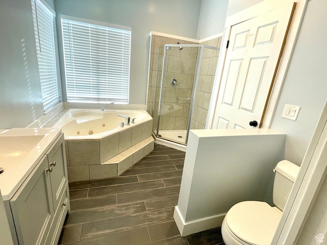 1668 N Lewis And Clark Dr, Centerville, UT 84014 - full bath with wood tiled floor, toilet, a shower stall, and a whirlpool tub