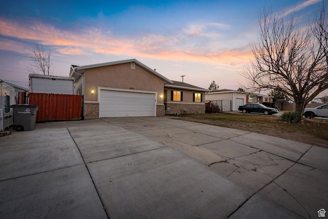 single story home with a garage