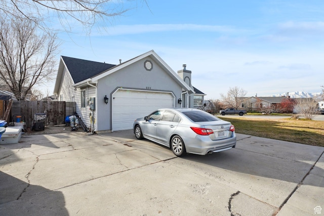 view of property exterior featuring a garage