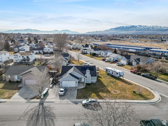drone / aerial view featuring a mountain view