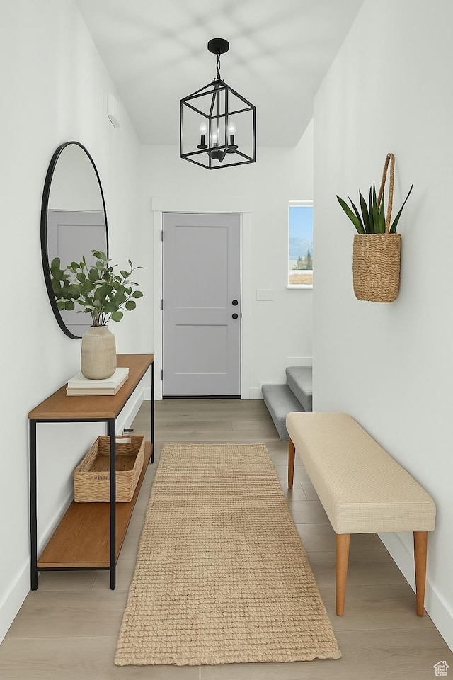 1317 N 1850 W, Clinton, UT 84015 - mudroom featuring light wood-style flooring, a chandelier, and baseboards