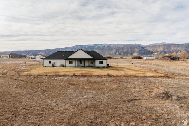 property view of mountains with a rural view