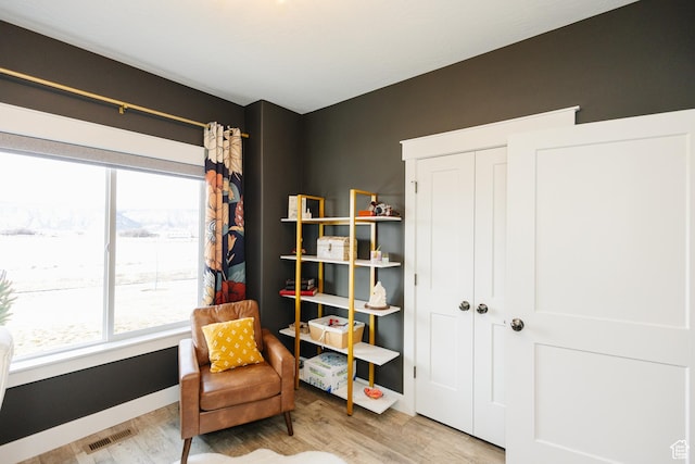 living area featuring hardwood / wood-style flooring