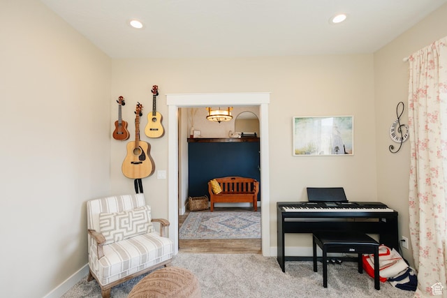 living area with carpet floors