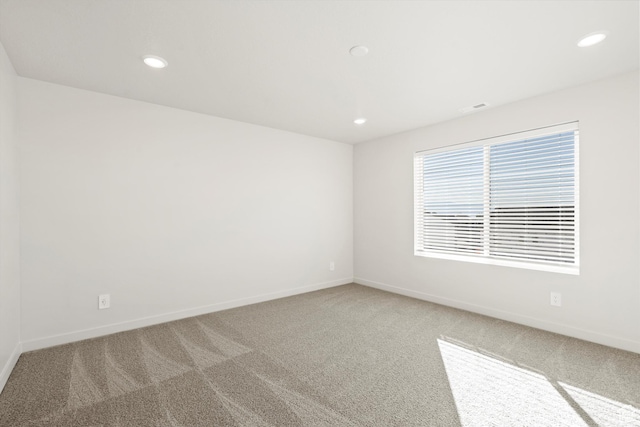 1367 N Harper Way Unit 0248, Tooele, UT 84074 - carpeted empty room with recessed lighting and baseboards