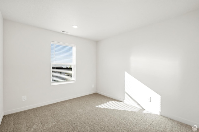 1367 N Harper Way Unit 0248, Tooele, UT 84074 - empty room featuring carpet floors and recessed lighting