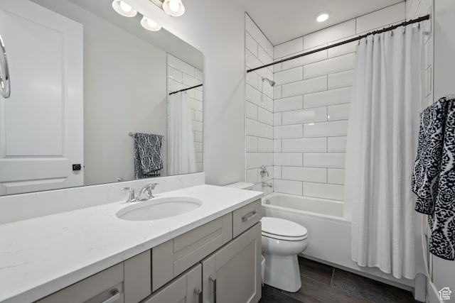 5629 S Adobe Sun Dr, St George, UT 84790 - full bathroom featuring shower / bath combo with shower curtain, vanity, and toilet