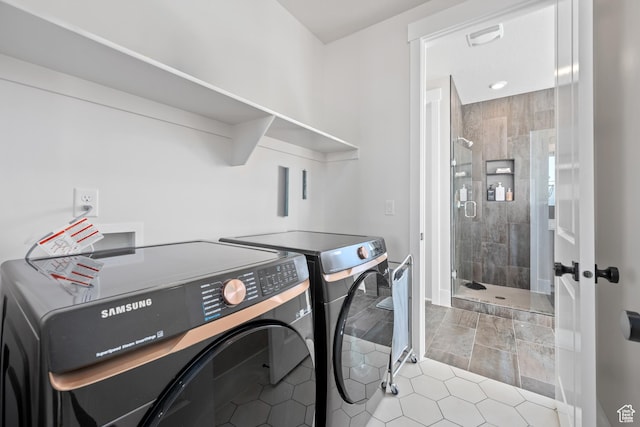 5629 S Adobe Sun Dr, St George, UT 84790 - clothes washing area featuring light tile patterned flooring and independent washer and dryer