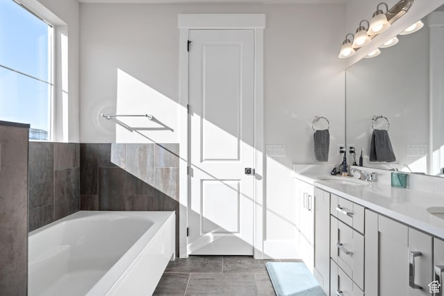 5629 S Adobe Sun Dr, St George, UT 84790 - bathroom with a bathtub and vanity
