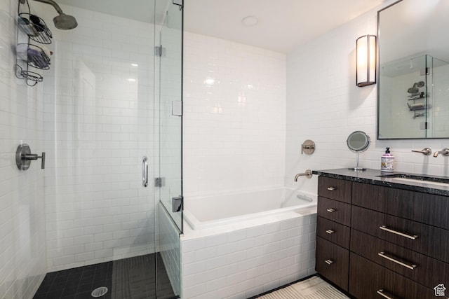 692 Main St Unit D, Park City, UT 84060 - bathroom with vanity, a shower with shower door, and tile walls