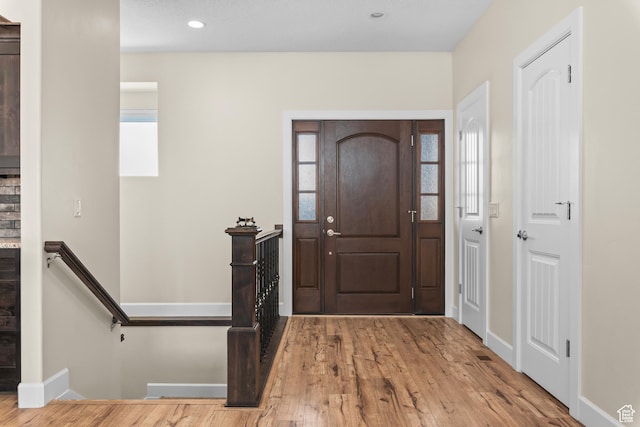 entrance foyer featuring light wood-type flooring