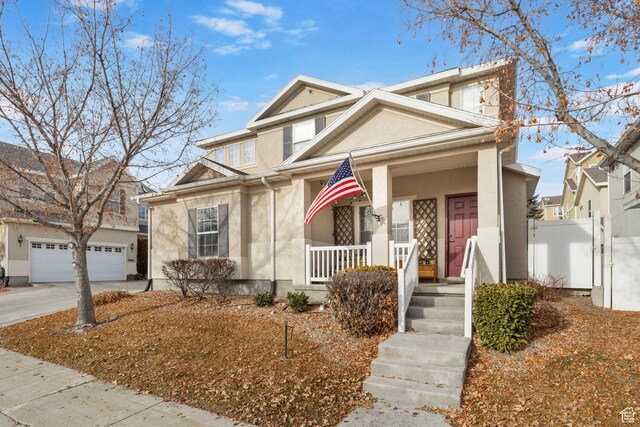 6854 W Callery S, West Jordan, UT 84081 - front of property featuring a porch and a garage
