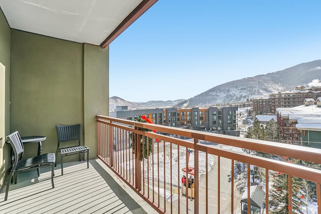 3855 Grand Summit Dr Unit 301, Park City, UT 84098 - snow covered back of property with a mountain view