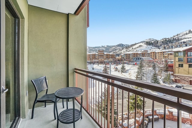 3855 Grand Summit Dr Unit 301, Park City, UT 84098 - snow covered back of property with a mountain view