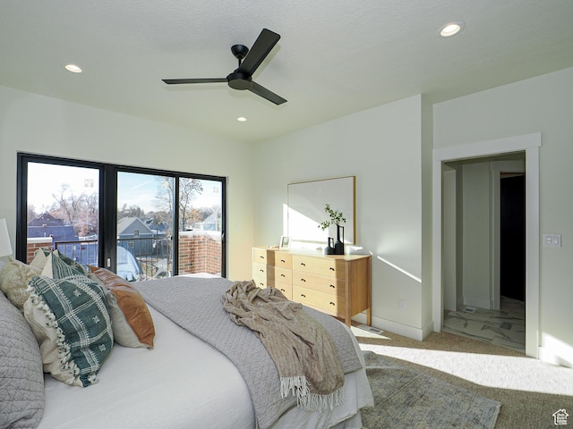 bedroom with recessed lighting, carpet, and access to outside