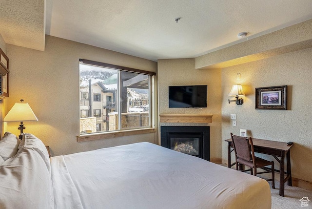 2669 Canyons Resort Dr Unit 308, Park City, UT 84098 - carpeted bedroom with a textured ceiling