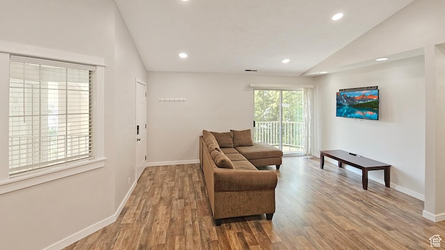 1303 N Riverside Ave Unit 36, Provo, UT 84604 - living area featuring vaulted ceiling, wood finished floors, and recessed lighting