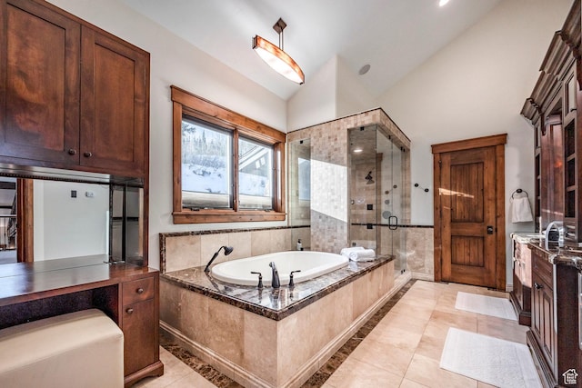 26 White Pine Canyon Rd, Park City, UT 84060 - bathroom featuring tile patterned flooring, vanity, separate shower and tub, and lofted ceiling