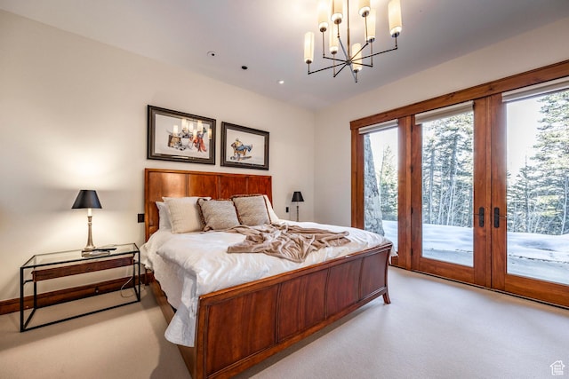 26 White Pine Canyon Rd, Park City, UT 84060 - carpeted bedroom with a notable chandelier, access to outside, and french doors