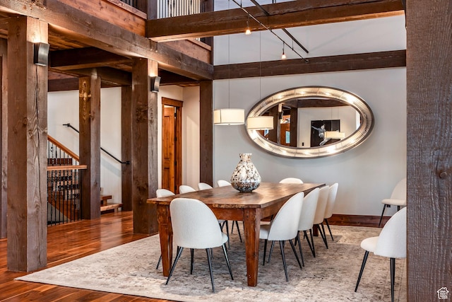 26 White Pine Canyon Rd, Park City, UT 84060 - dining area featuring hardwood / wood-style floors and a high ceiling