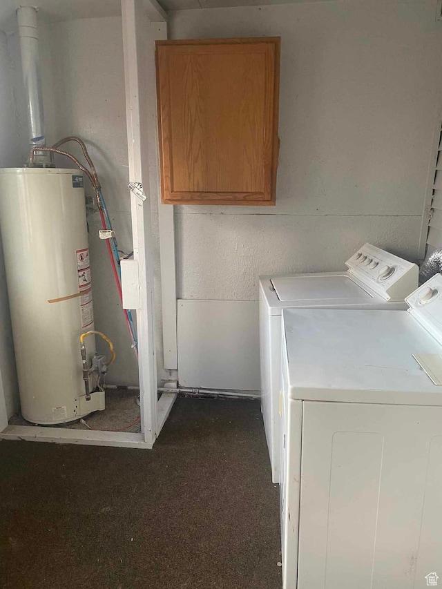 312 N 500 E, Vernal, UT 84078 - laundry room featuring cabinets, gas water heater, and washing machine and clothes dryer