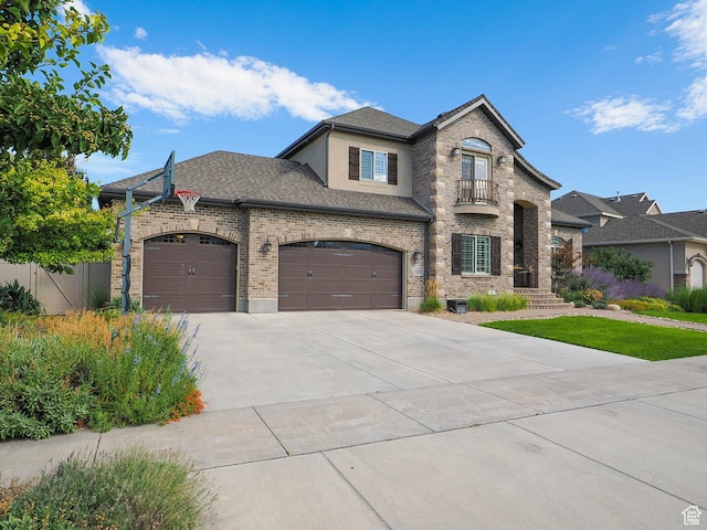 13234 S Lone Rock Dr E, Draper, UT 84020 - french country inspired facade featuring a garage and a balcony