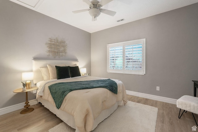13234 S Lone Rock Dr E, Draper, UT 84020 - bedroom with ceiling fan and wood-type flooring