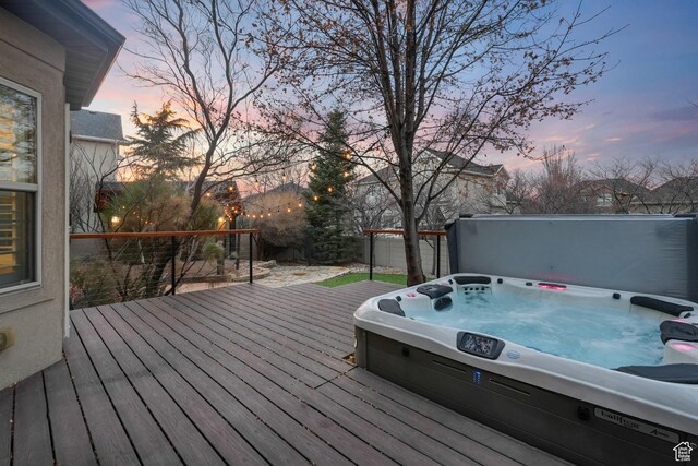 13234 S Lone Rock Dr E, Draper, UT 84020 - deck at dusk featuring a covered hot tub