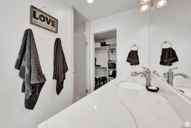 1021 N 600 E, Morgan, UT 84050 - bathroom with a shower stall, a walk in closet, and vanity