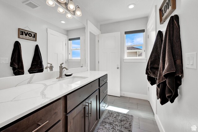 1021 N 600 E, Morgan, UT 84050 - bathroom with baseboards, vanity, and recessed lighting